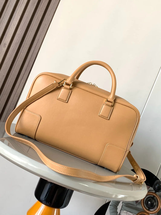 Modern Leather Tote Bag with Golden Lock Detail, Smooth Finish, and Durable Build